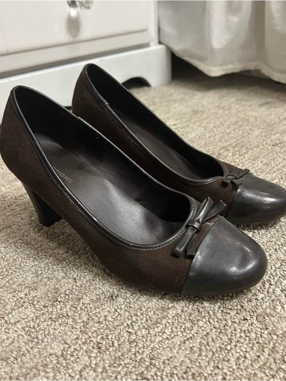 brown and black heels with bows!